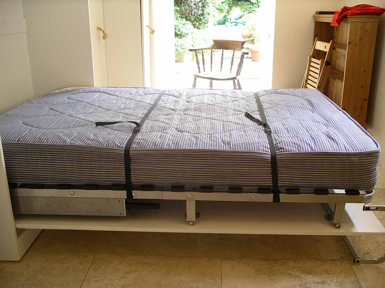 fold away bed in custom made cabinet