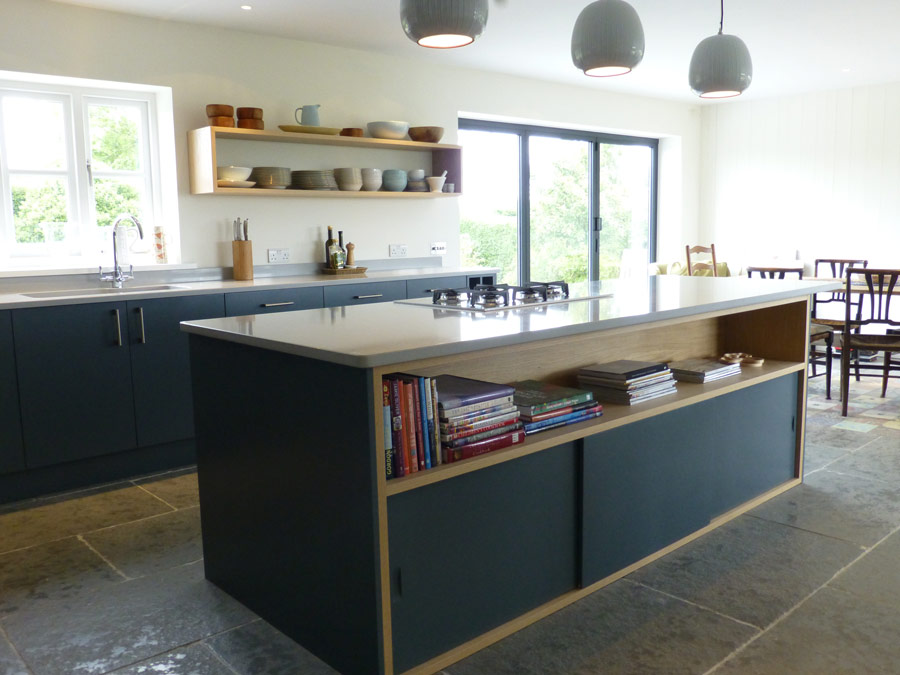 bespoke kitchen island with oak cabinet and sliding doors