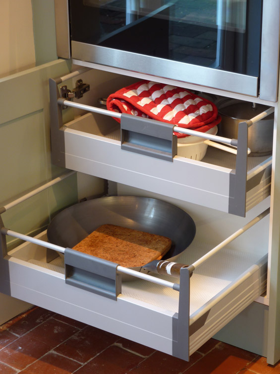 interior pan drawers made by Blum sit behind traditional Shaker door