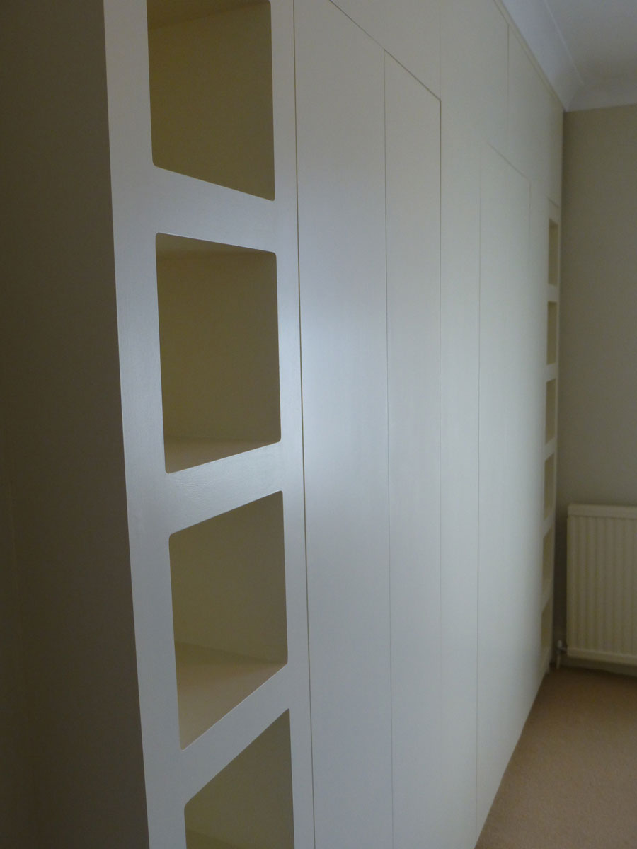 lift up doors wall-to-wall bespoke wardrobe in Farrow and Ball White Tie
