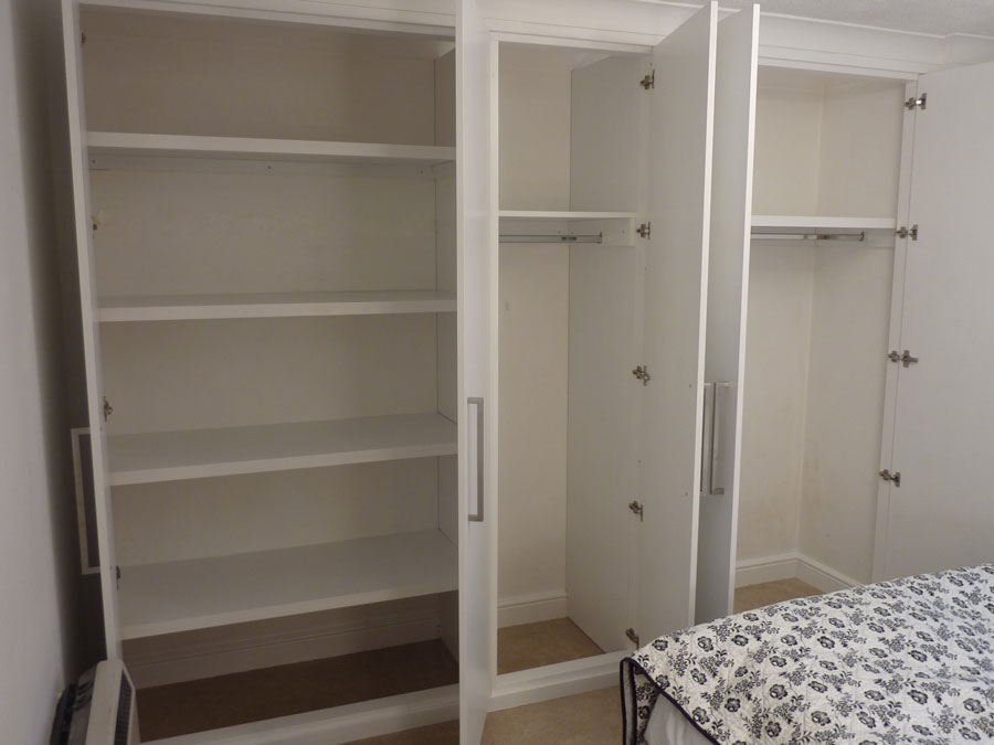 interior storage space in bespoke fitted wardrobe