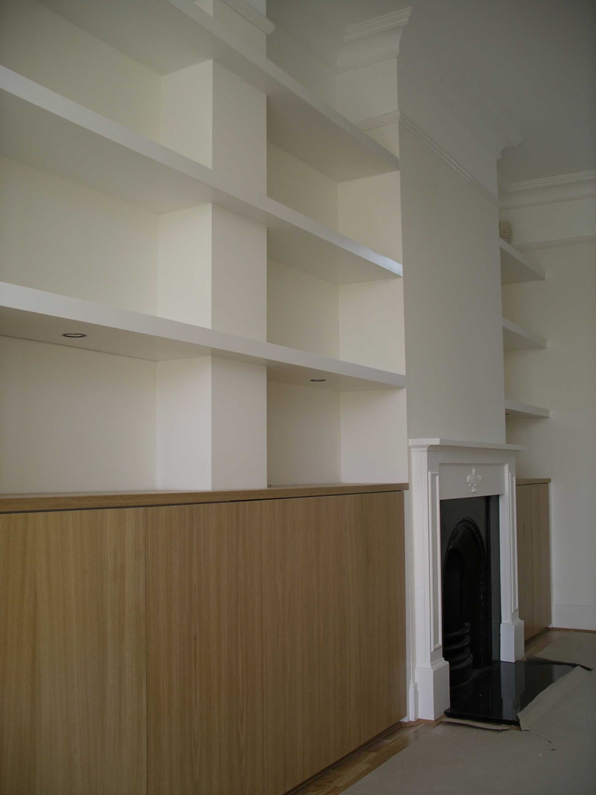 oak veneered alcove cabinet with floating shelves