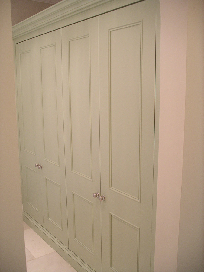 made to measure fitted linen cupboard with panel doors