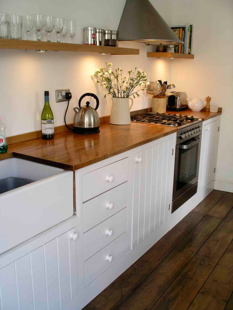 traditional bespoke kitchen with painted tongue and groove doors ste in fully framed cabinets