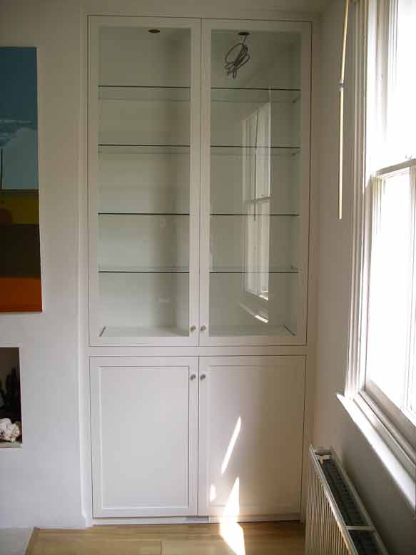 fitted cabinet with glazed doors