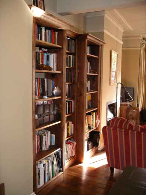 fitted bookcase in dark oak