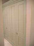 period design linen cupboard with traditional framed doors