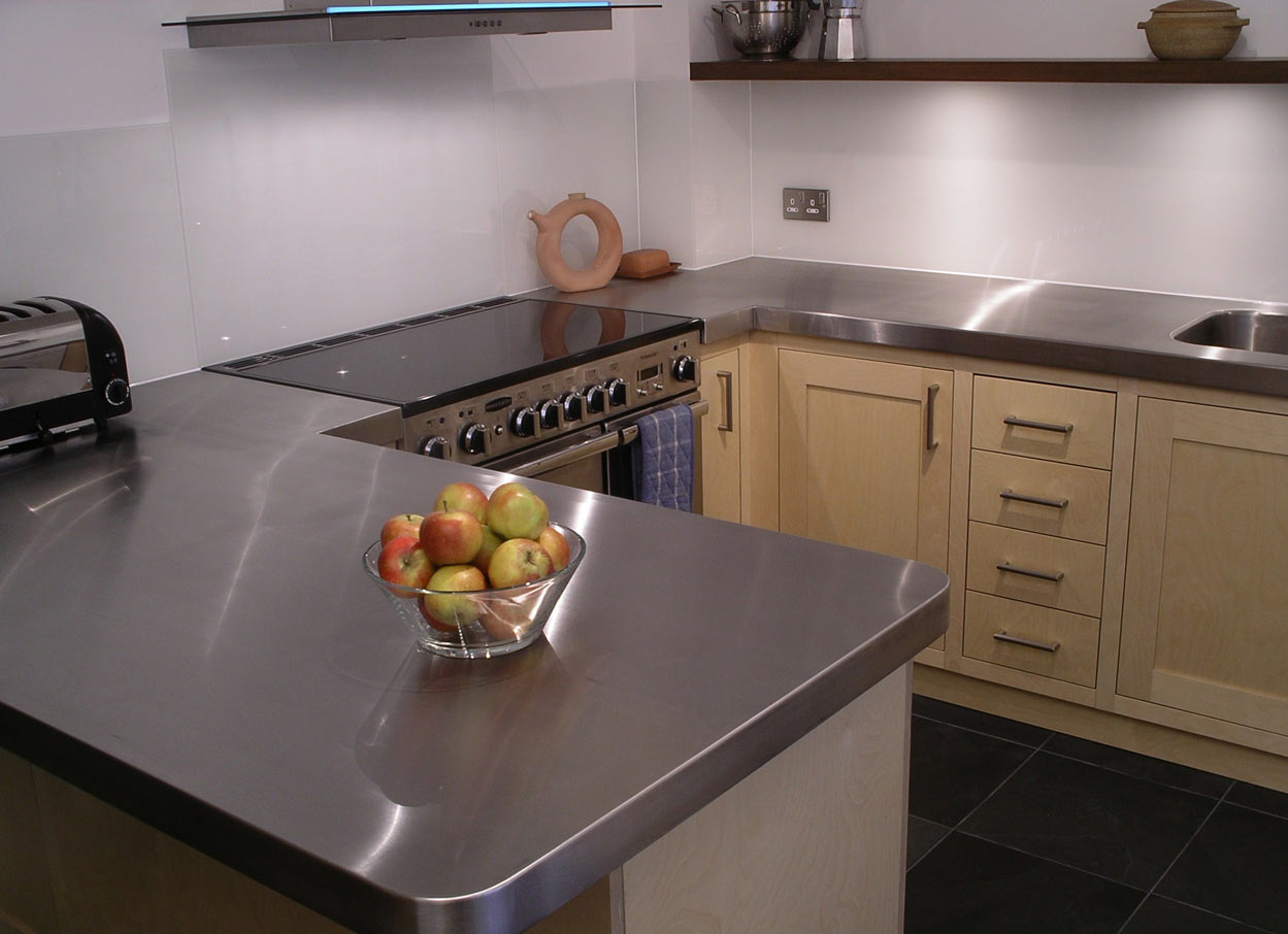 breakfast bar custom made in stainless steel  for bespoke fitted kitchen