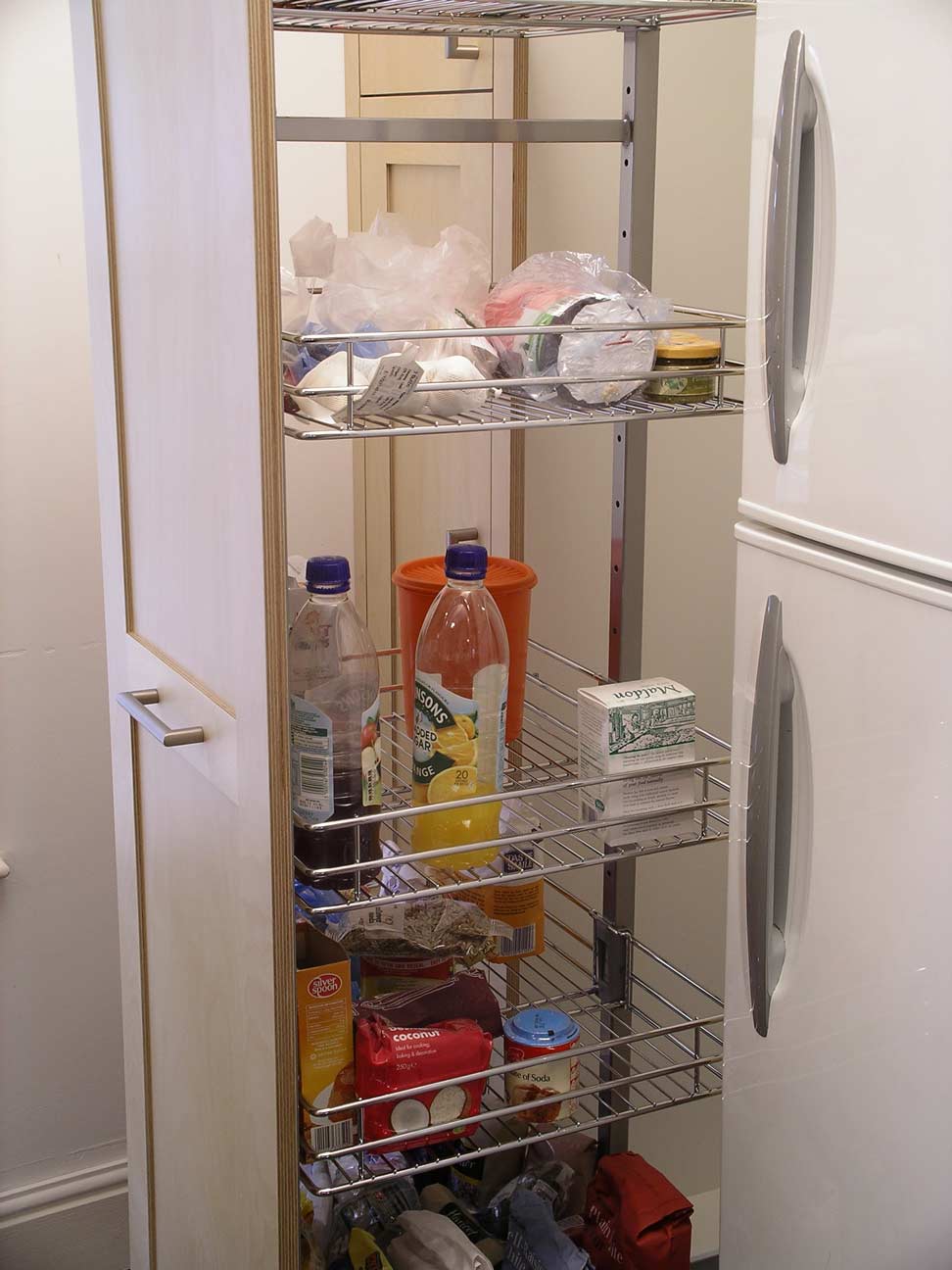 pull-out larder storage in custom made cabinet