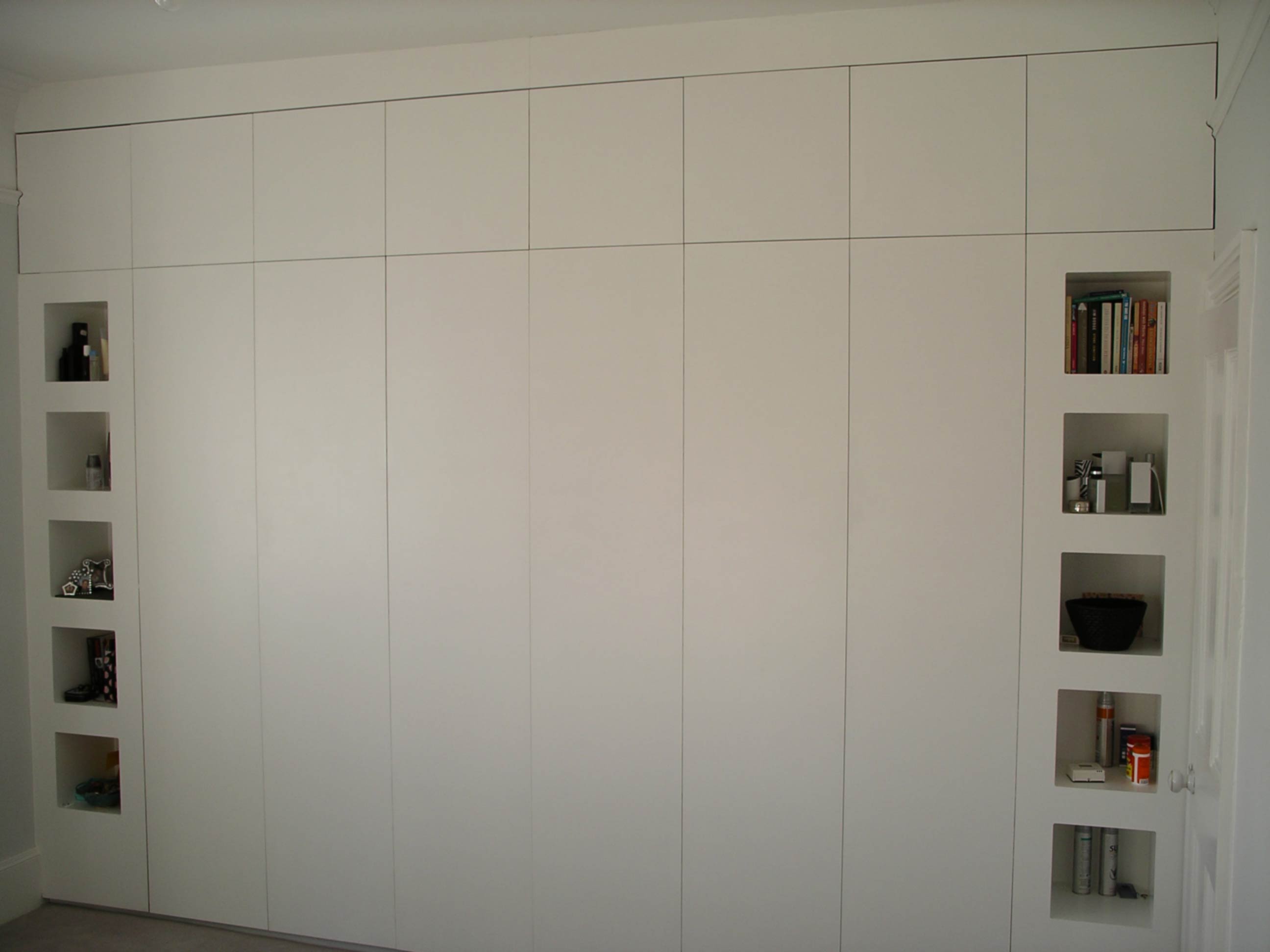 floor to ceiling fitted bespoke cupboard