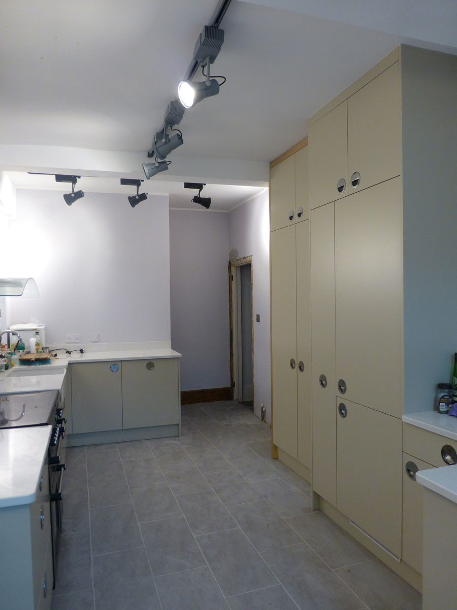spray finished bespoke kitchen with birch ply doors