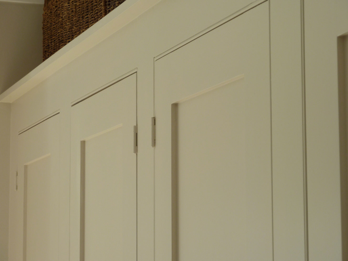 paneled doors set in a beaded face frame custom made bedroom furniture